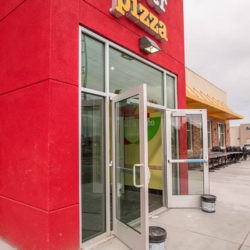 Close-up of Peter Piper Pizza Commercial Storefront Entryway Glass