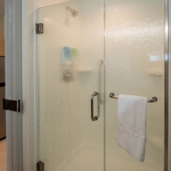 Home to Suites Shower Door Enclosure System by A Cutting Edge Glass
