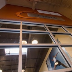 Close-up of Storefront Door System and Transom Windows at 24 Hour Fitness
