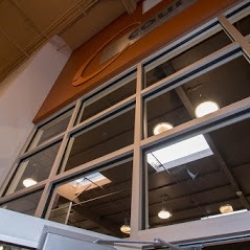Close-up of Storefront Door System and Transom Windows at 24 Hour Fitness