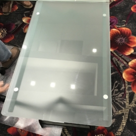 Frosted glass up glued to stand-off for table top